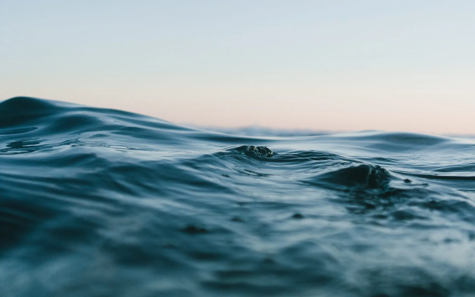 Calm sea water at dusk off the Cornish coast